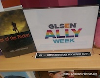 A book and glsen ally week card on the table